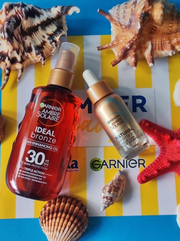Uwielbiam krople samoopalające do twarzy Garnier Ambre Solaire Natural Bronzer, które nadają skórze naturalny, złocisty blask bez smug, Na plażę zawsze zabieram olejek przyspieszający opalanie SPF 30 Garnier Ambre Solaire, który nawilża i chroni skórę przed szkodliwym promieniowaniem.